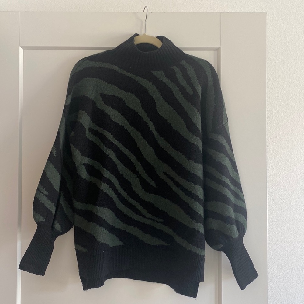 Black and green zebra print cowl neck sweater with bell sleeves